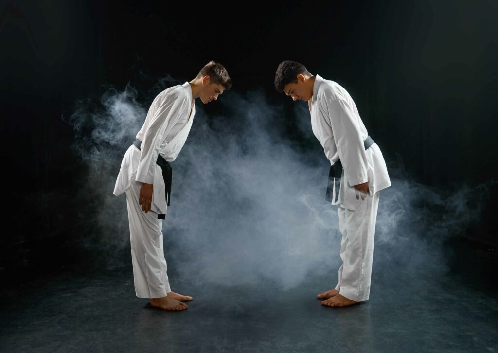 two male karatekas in white kimono combat 2022 02 06 05 36 10 utc